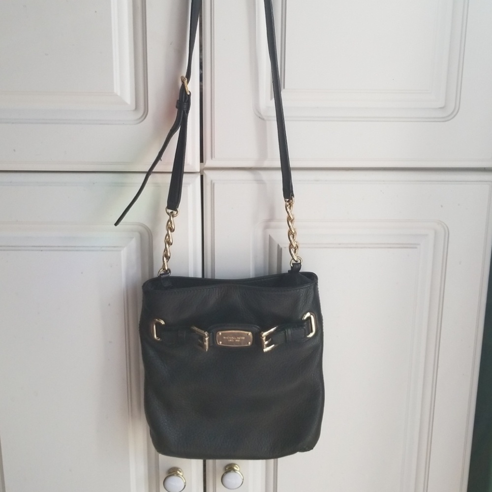 Michael Kors. Black crossbody bag..